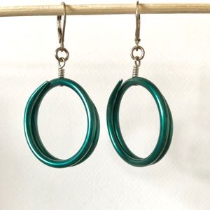 Hoop earrings made from vintage knitting needles.